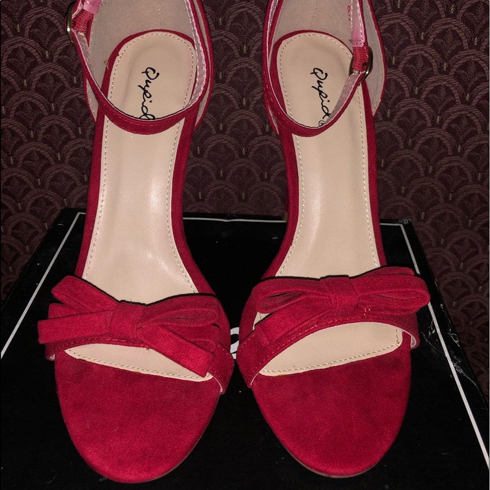 Qupid red heels.